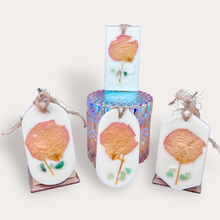 Load image into Gallery viewer, Fruity Apricot Sachets by Pure Essence Scent-white scented wax decorated with dried botanicals and pebbles for decoration, and twine loop for hanging.