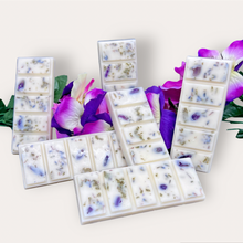 Load image into Gallery viewer, Summer Fields Wax Melts by Pure Essence Scent—white scented wax decorated with dried botanicals and decorative pebbles.