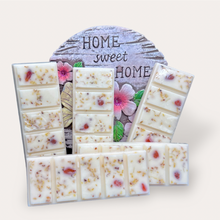 Load image into Gallery viewer, Pleasant Sunshine Wax Melts by Pure Essence Scent—white scented wax decorated with dried botanicals and decorative pebbles.