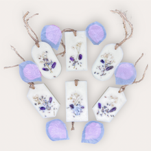 Load image into Gallery viewer, Summer Fields Sachets by Pure Essence Scent-white scented wax decorated with dried botanicals and pebbles for decoration, and twine loop for hanging.