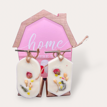 Load image into Gallery viewer, Strawberry Punch Sachets by Pure Essence Scent-white scented wax decorated with dried botanicals and pebbles for decoration, and twine loop for hanging.