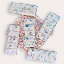Load image into Gallery viewer, Calming Creek Wax Melts by Pure Essence Scent—white scented wax decorated with dried botanicals and decorative pebbles.