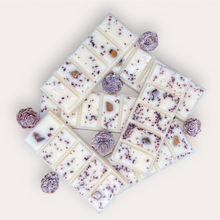 Load image into Gallery viewer, Cozy Nights Wax Melts by Pure Essence Scent—white scented wax decorated with ground coffee and decorative pebbles.