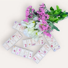 Load image into Gallery viewer, Blooming Flowers Wax Melts by Pure Essence Scent—white scented wax decorated with dried botanicals and decorative pebbles.