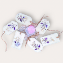 Load image into Gallery viewer, Summer Fields Sachets by Pure Essence Scent-white scented wax decorated with dried botanicals and pebbles for decoration, and twine loop for hanging.