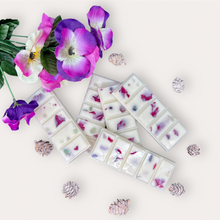 Load image into Gallery viewer, Lovely Garden Wax Melts by Pure Essence Scent—white scented wax decorated with dried botanicals and decorative pebbles.
