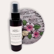 Load image into Gallery viewer, Blooming Flowers Room and Linen Spray by Pure Essence Scent-Amber plastic spray bottles filled with scented liquid.