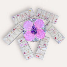 Load image into Gallery viewer, Blooming Flowers Wax Melts by Pure Essence Scent—white scented wax decorated with dried botanicals and decorative pebbles.