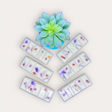 Load image into Gallery viewer, Pomegranade Wax Melts by Pure Essence Scent—white scented wax decorated with dried botanicals and decorative pebbles.