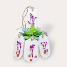 Load image into Gallery viewer, Pomegranade Sachets by Pure Essence Scent-white scented wax decorated with dried botanicals and pebbles for decoration, and twine loop for hanging.