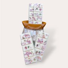 Load image into Gallery viewer, Fruity Apricot Wax Melts by Pure Essence Scent—white scented wax decorated with dried botanicals and decorative pebbles.