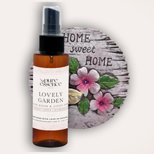 Load image into Gallery viewer, Lovely Garden Room and Linen Spray by Pure Essence Scent-Amber plastic spray bottles filled with scented liquid.